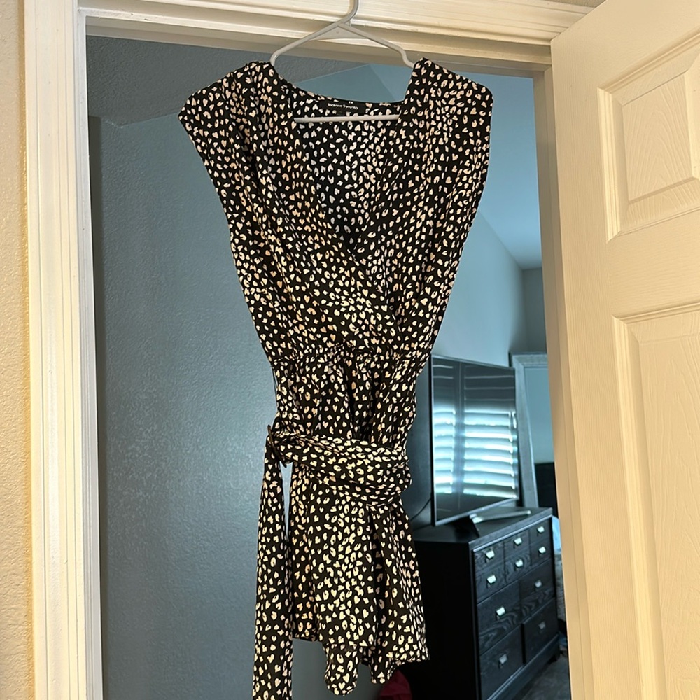 Black and cream romper with belt